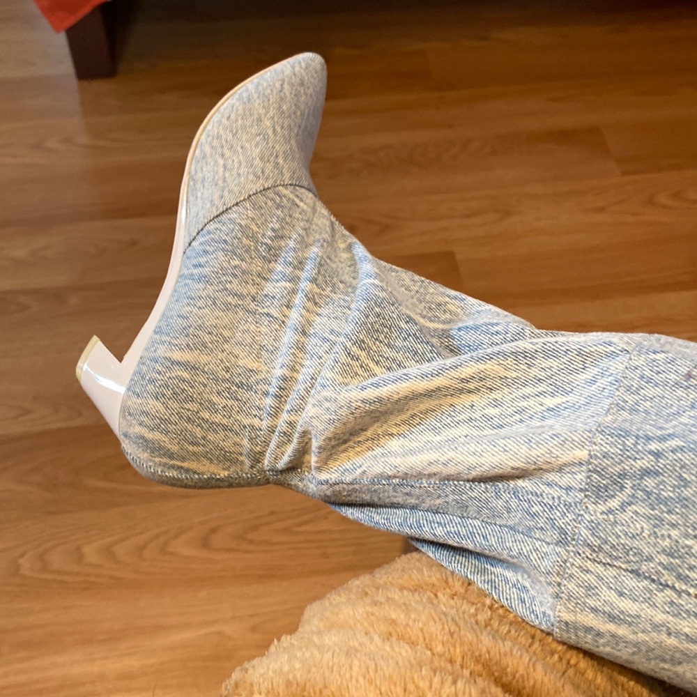 Size 5 below the knee Jean color boot.